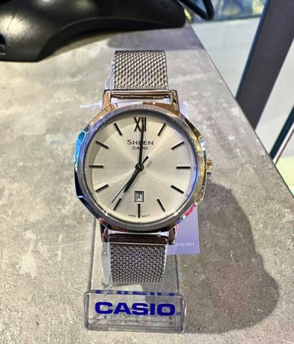 Đồng hồ Casio SHE-4554M-7AUDF Nữ máy Pin (Quartz) Dây Lưới mặt Bát Giác chính hãng